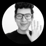 Designer Carlos Cusguen framed in a circle waiving to the camera in black and white